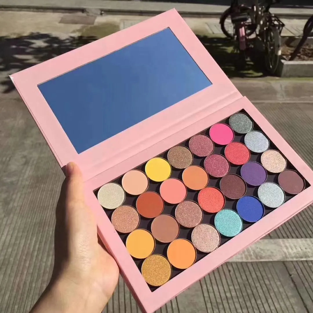 Close-up view of eyeshadow palette demonstrating blendable texture