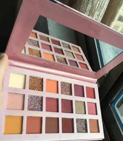 18-color eyeshadow palette showing rose gold and nude shades