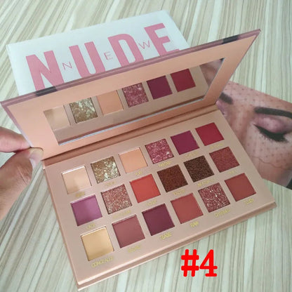 Close-up view of eyeshadow palette with color swatches displayed