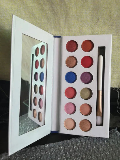 Swatch of matte eyeshadow shades from the palette on skin