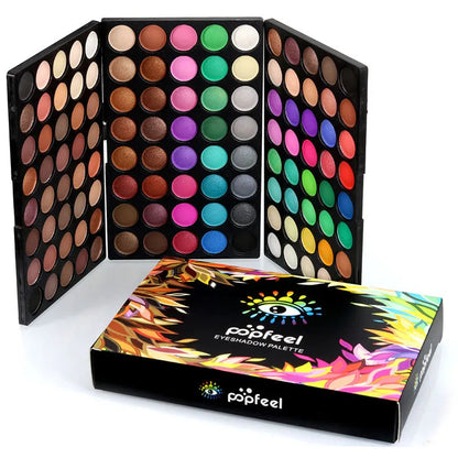 Open eyeshadow palette showing 120 color squares in warm earth and nude tones
