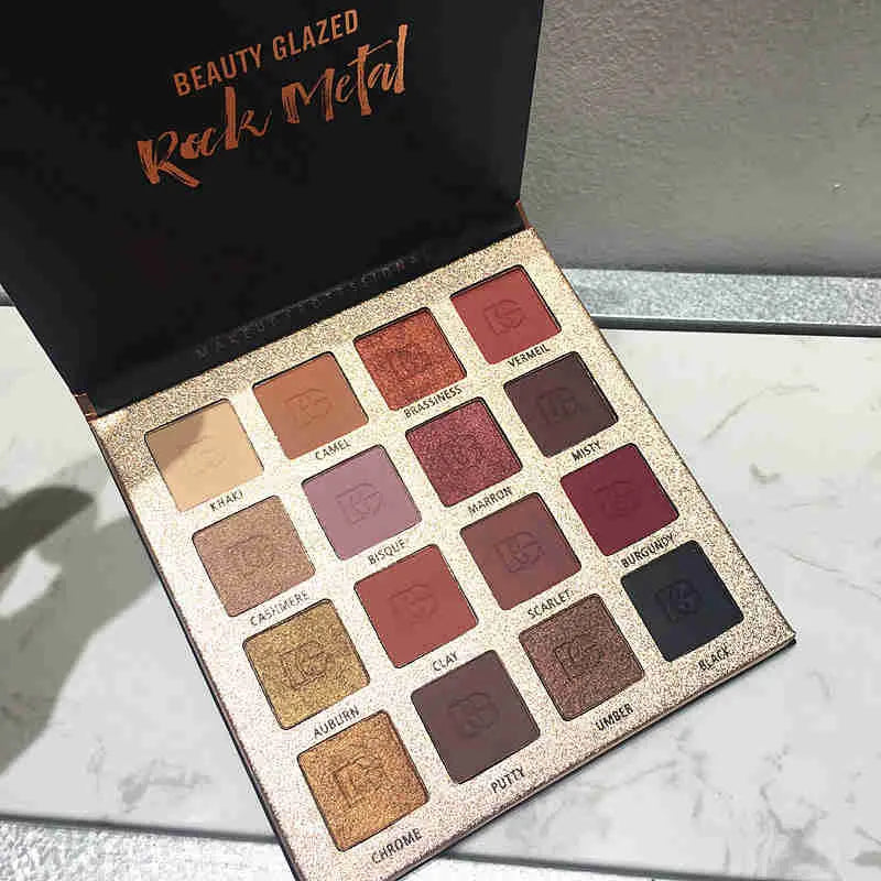 Open eyeshadow palette showing matte and glitter nude shades