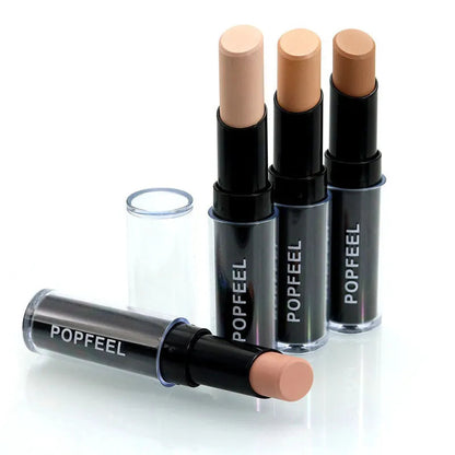 Set of multiple concealer sticks arranged in display case