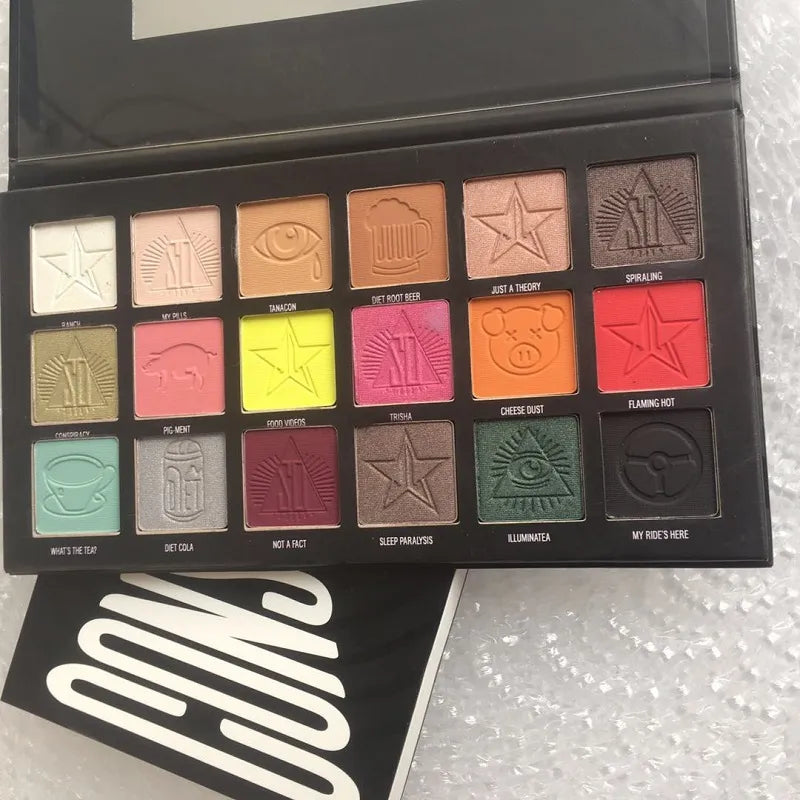 Close-up view of eyeshadow palette with matte and shimmer finishes