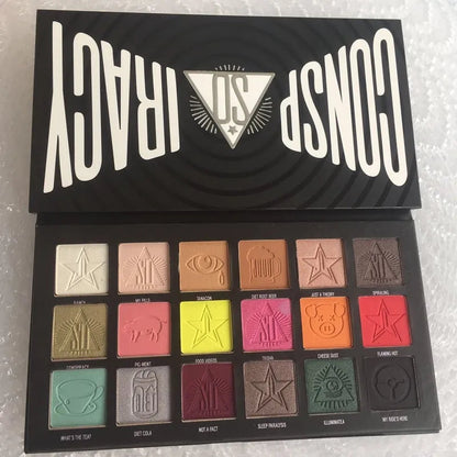 Open eyeshadow palette showing 18 different color shades